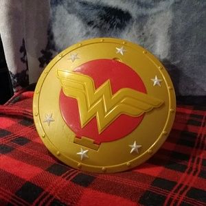 Wonder Woman shooting Shield